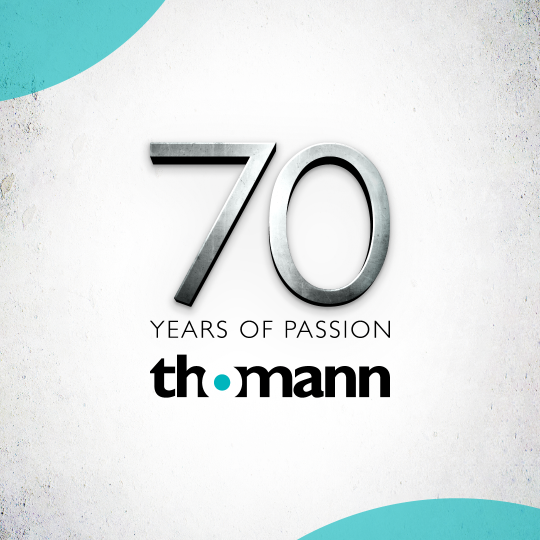 a logo of thomann 70 years of passion